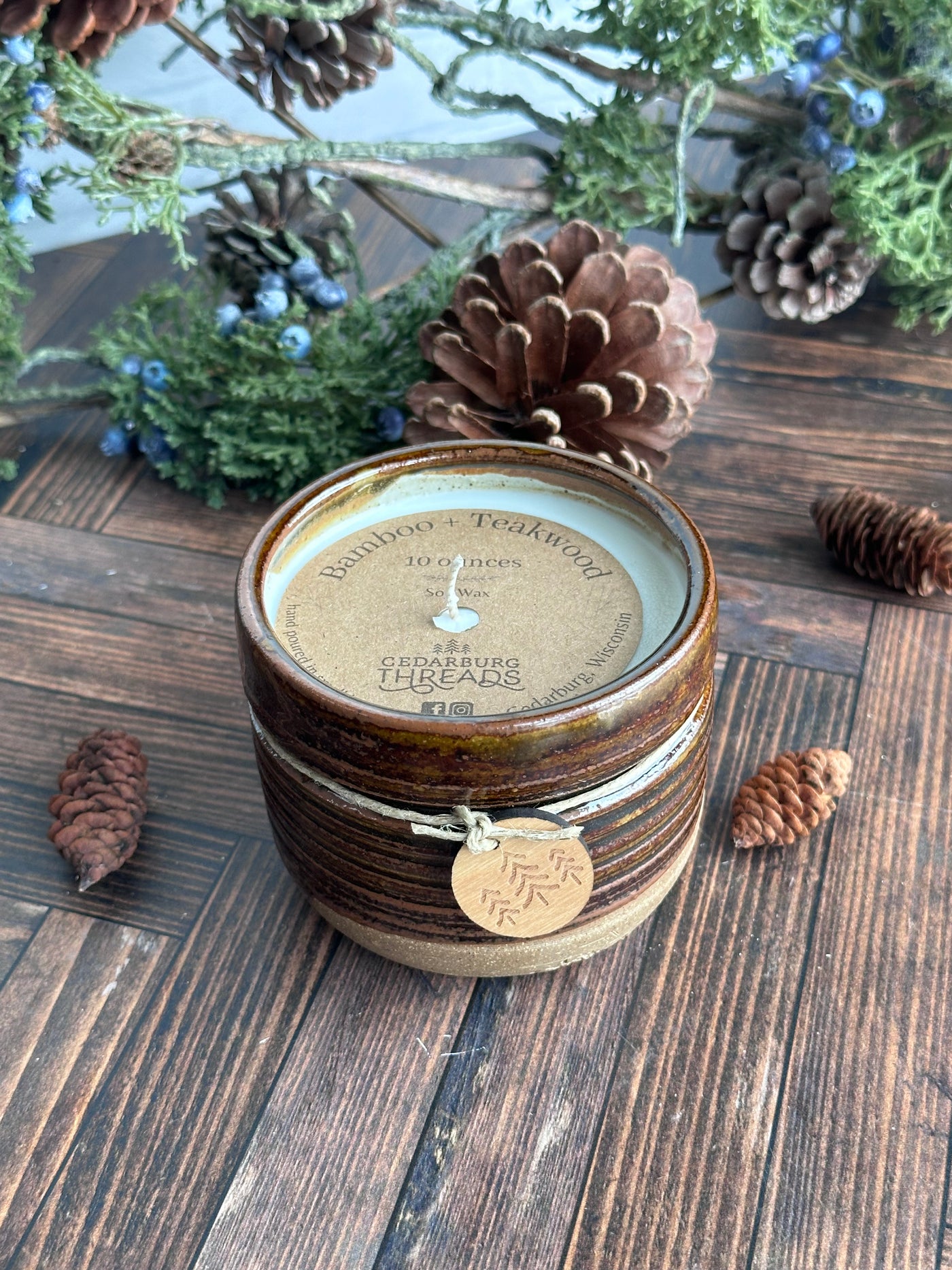 10 oz Bamboo & Teakwood soy candle in brown ceramic vessel