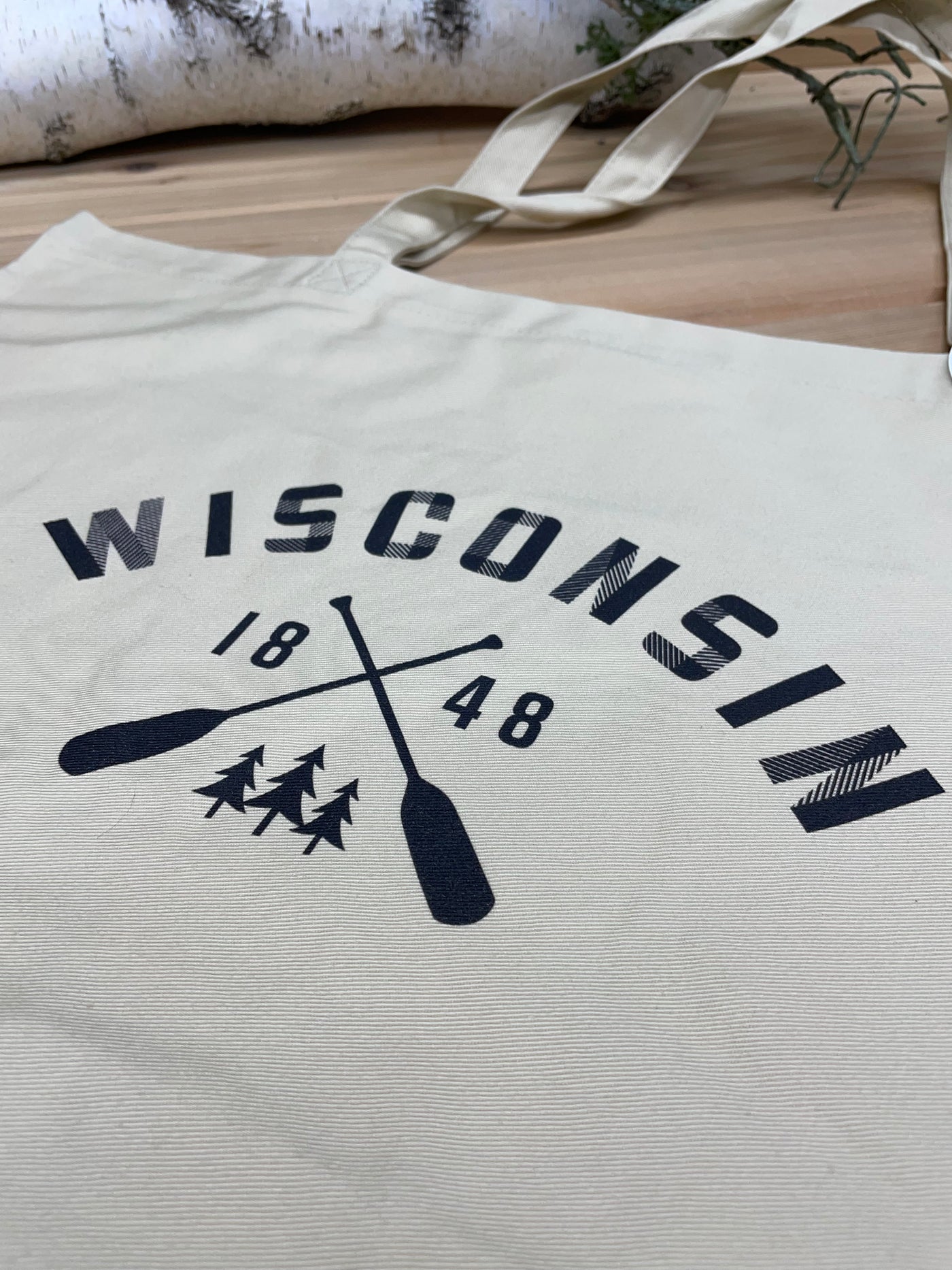 Wisconsin paddle design in black on organic canvas tote bag