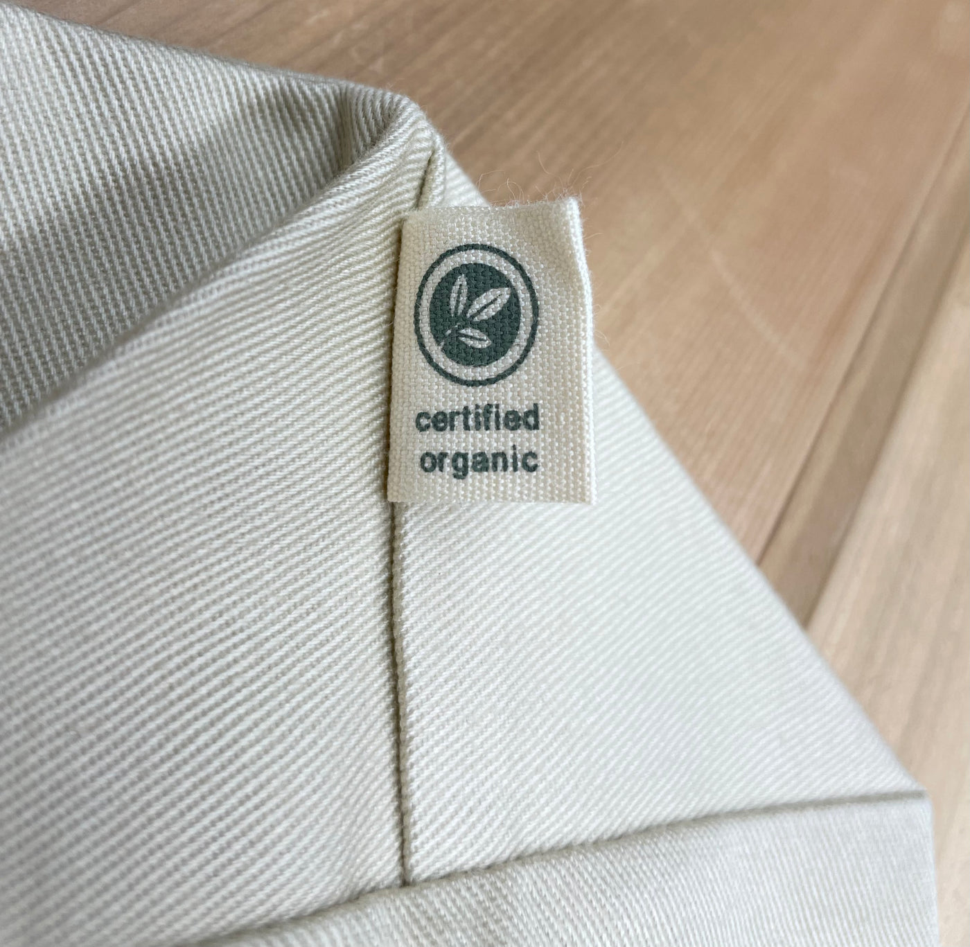 close up of organic cotton tag on the bag's bottom