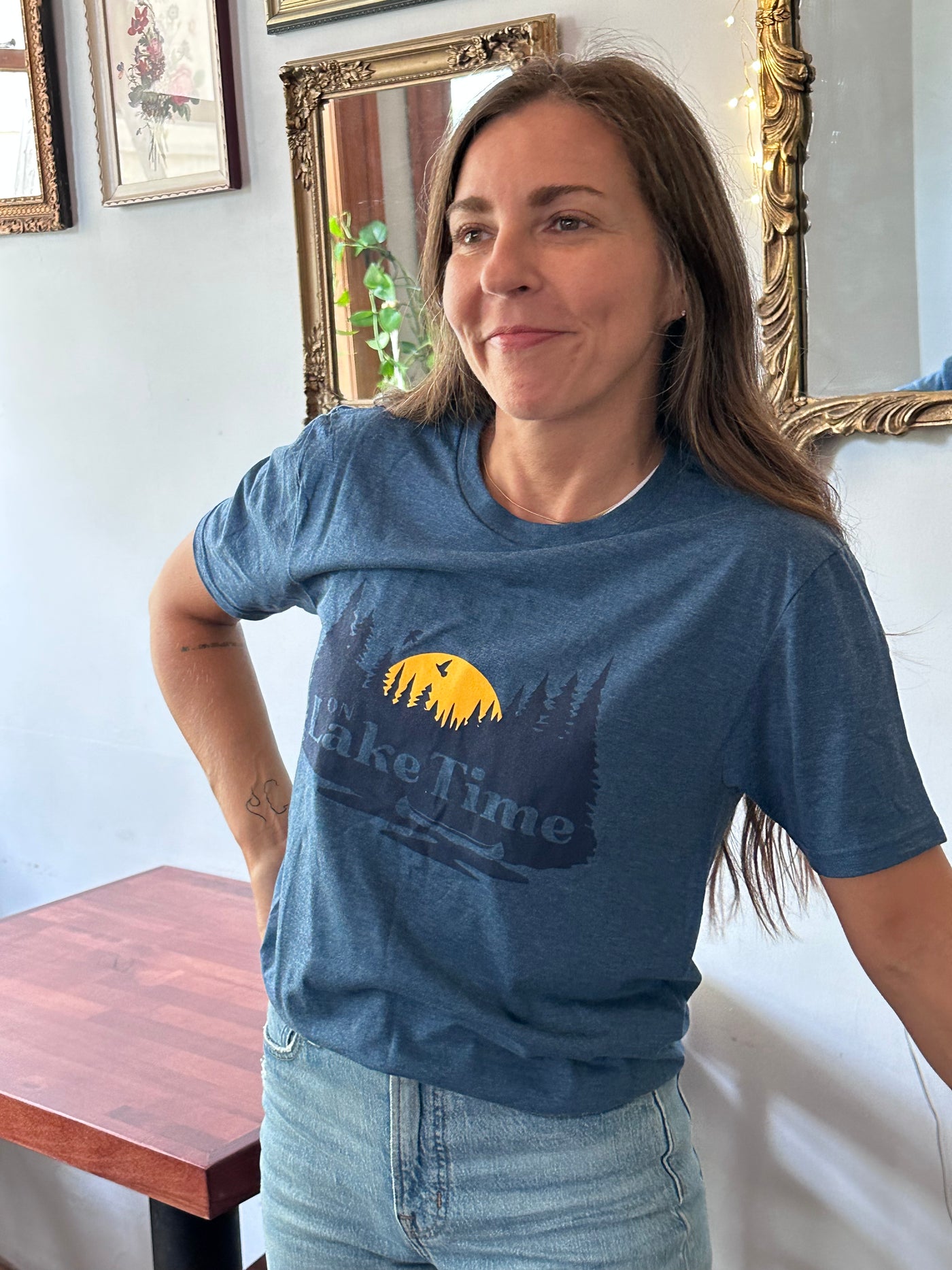 blue triblend unisex short sleeve tee with On Lake Time design in navy and yellow