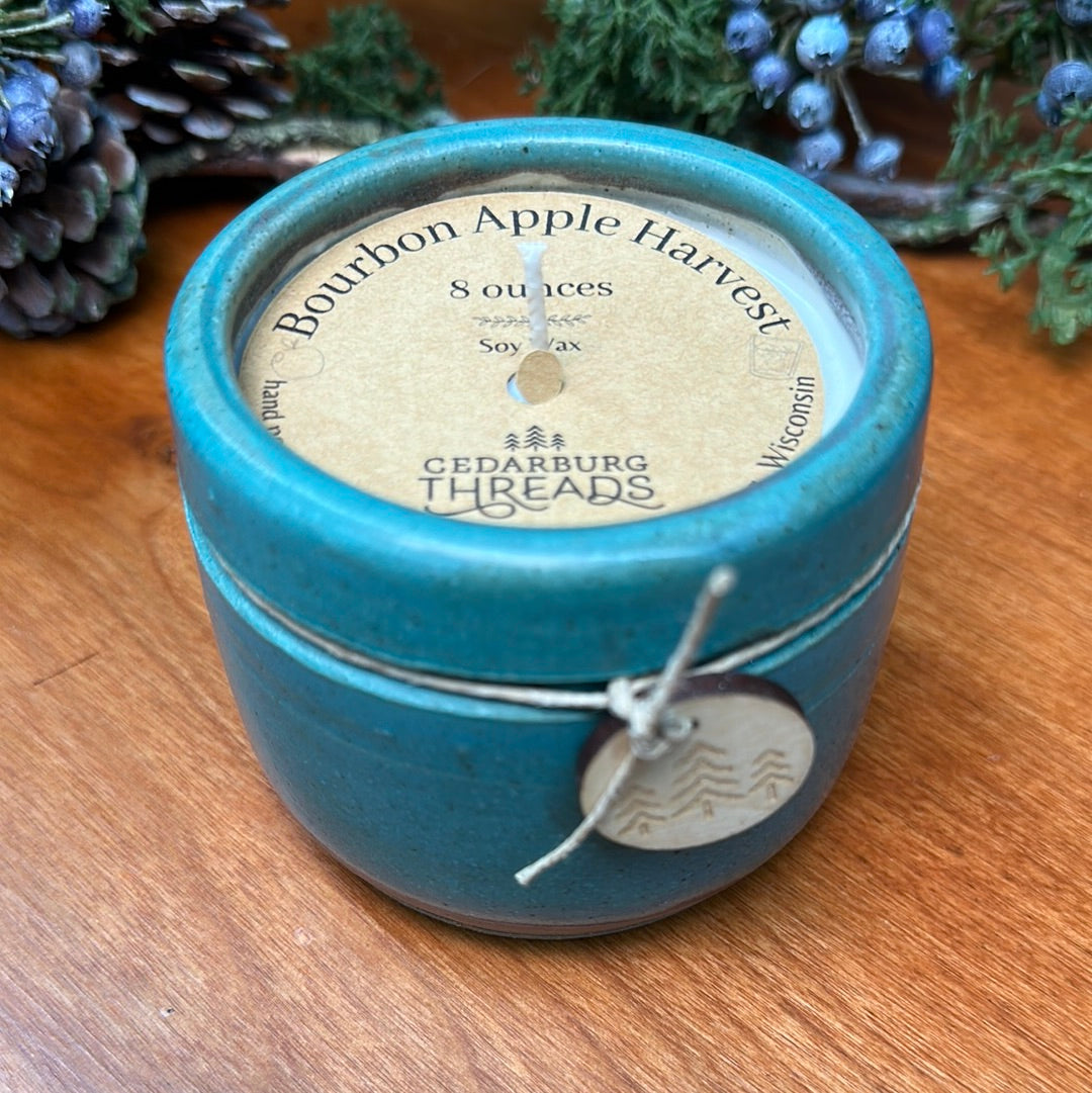 Bourbon Apple Harvest soy candle 8 ounces in teal ceramic vessel