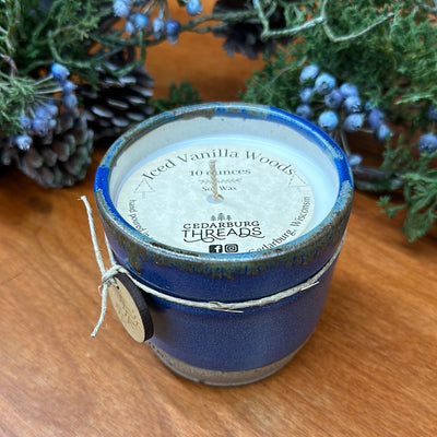 Iced Vanilla Woods hand poured soy candle  in an 10 ounce blue ceramic vessel