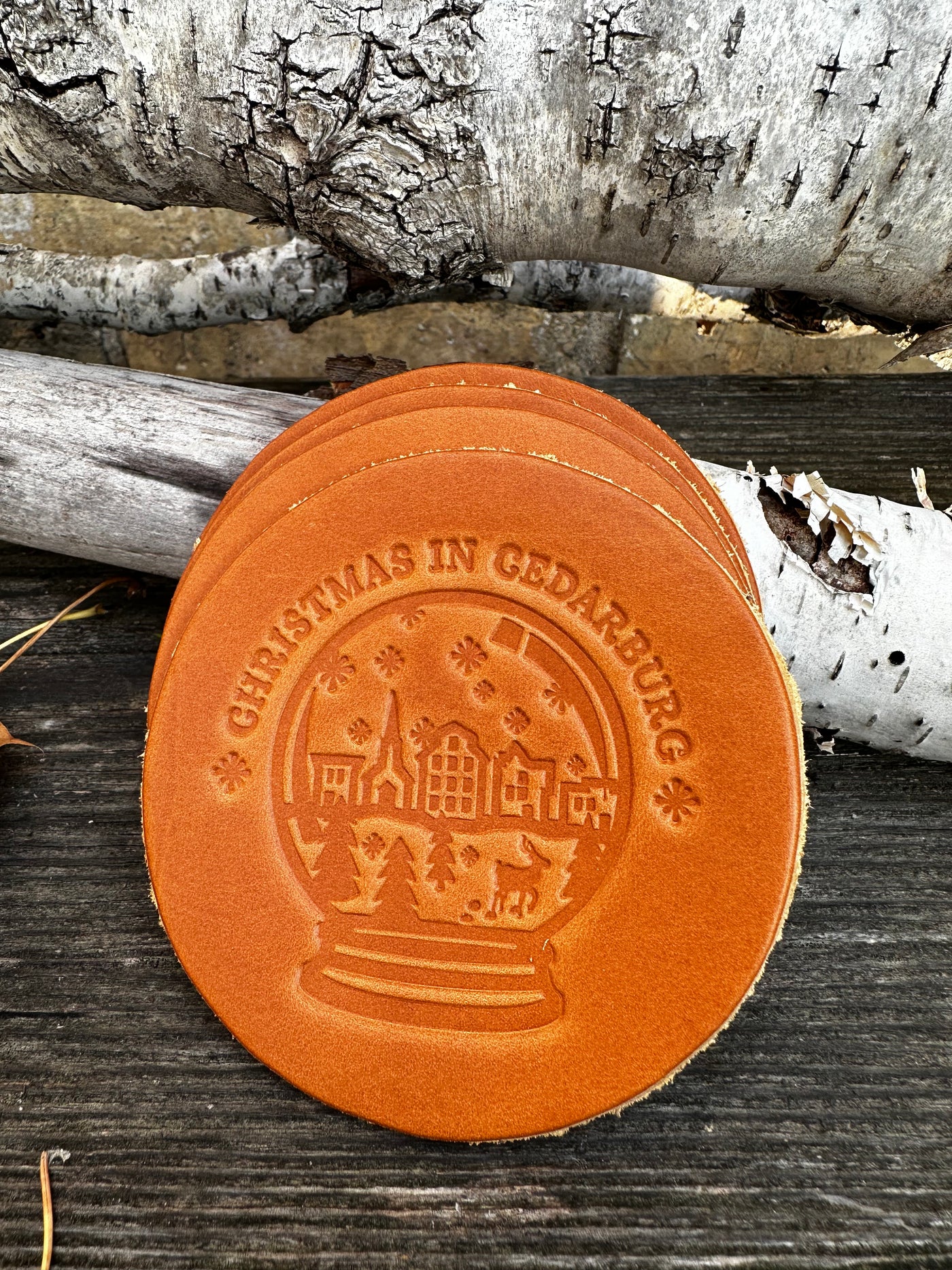 Tan Cedarburg Snow Globe Leather coaster