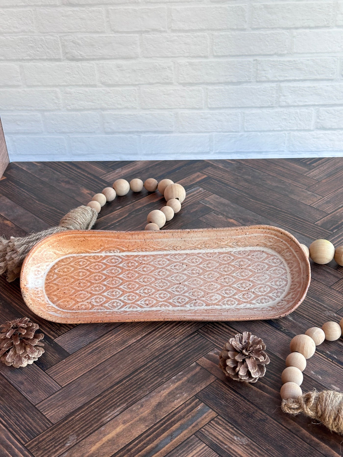 small patterned ceramic tray in natural color