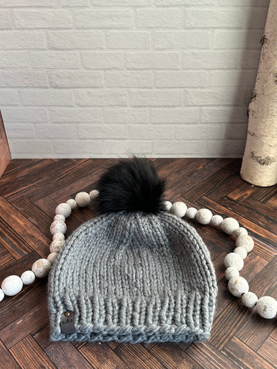 Grey with black faux fur pom knit beanie hat