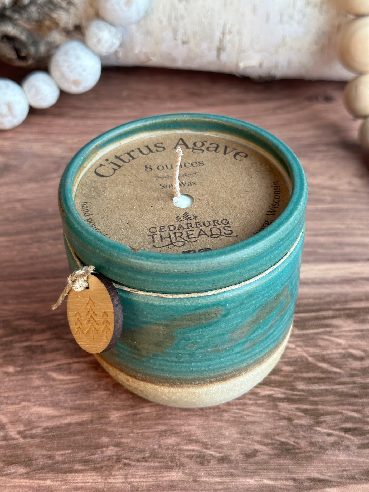 Citrus Agave hand poured soy candle in 8 ounce teal  ceramic candle vessel