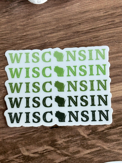 White vinyl sticker with various green Wisconsin printing and Wisconsin shape