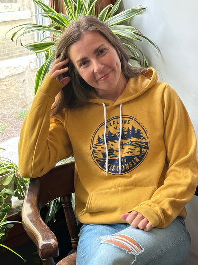 Mustard unisex hoodie with navy Explore Wisconsin paddle design