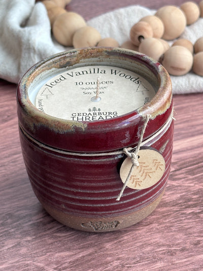 Iced Vanilla Woods hand poured soy candle  in a 10 ounce red ceramic vessel