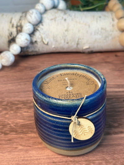 Mint & Eucalyptus soy hand poured candle in a 10 ounce blue vessel