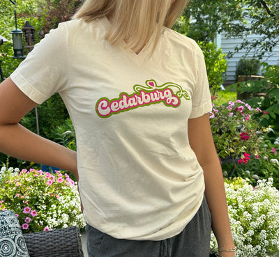 Unisex short sleeve v-neck t-shirt in natural color with Green and pink Cedarburg heart design