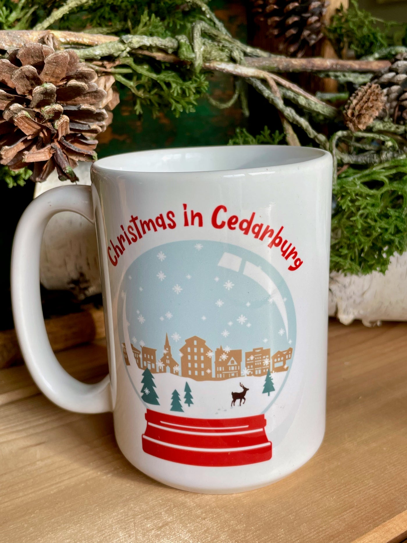 White ceramic Cedarburg snow globe mug in full color print