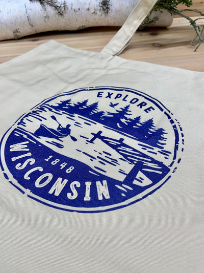 Organic cotton canvas tote bag with navy Explore Wisconsin paddle design