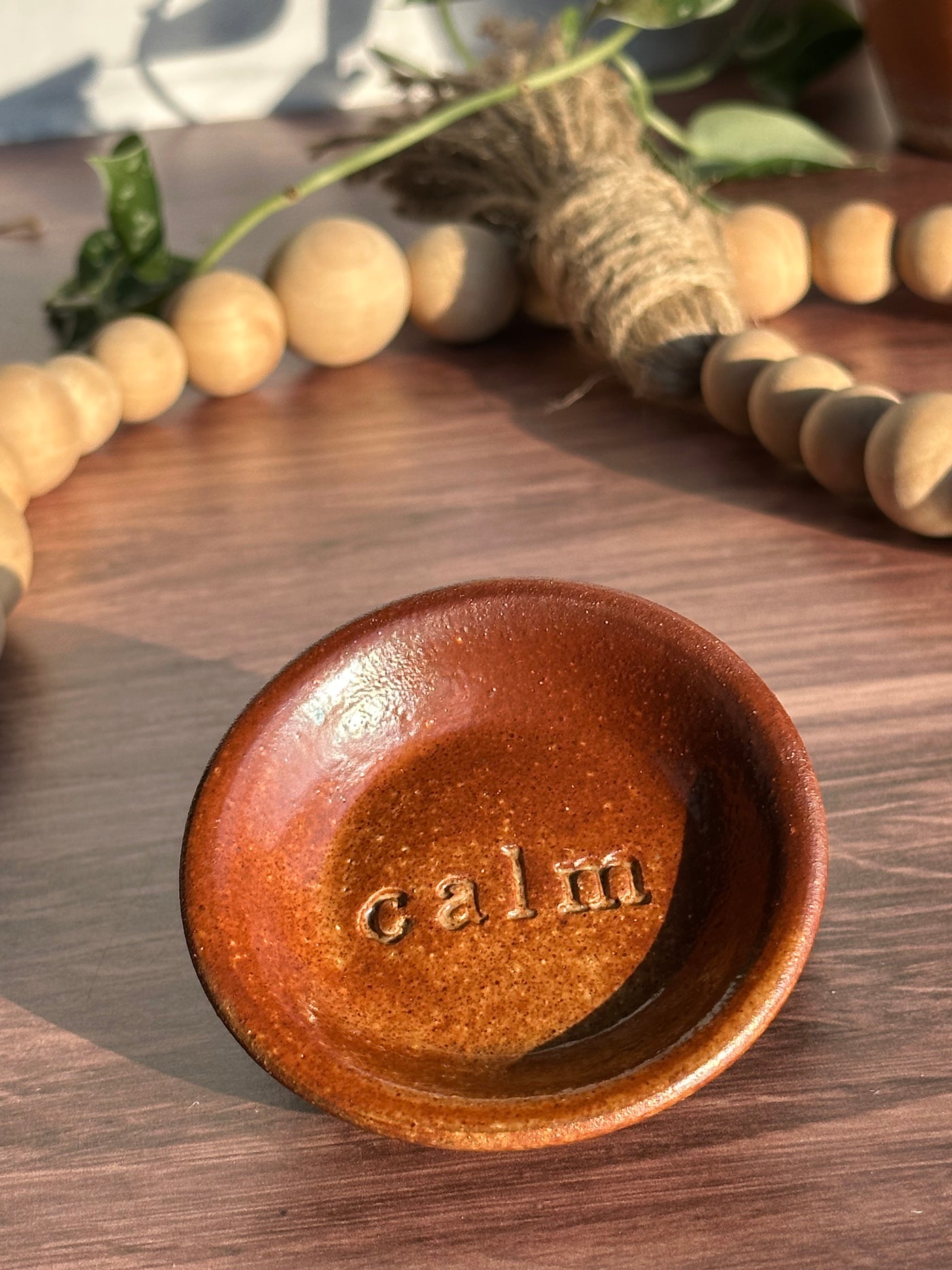 Brown ceramic calm wish dish