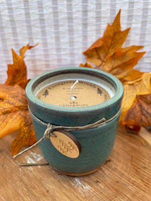 Teal 8 ounce ceramic candle with Evergreen Woods soy wax