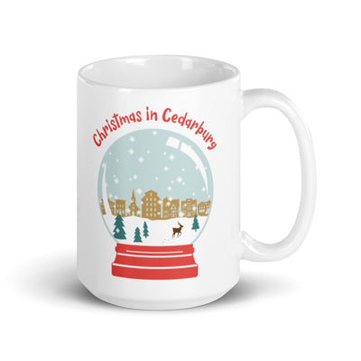 White ceramic mug with full color Snow Globe Cedarburg design