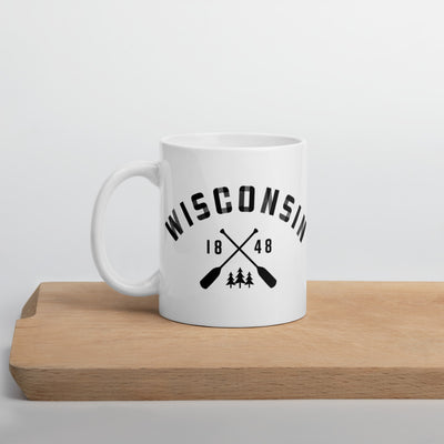 White ceramic mug with black Wisconsin paddle design